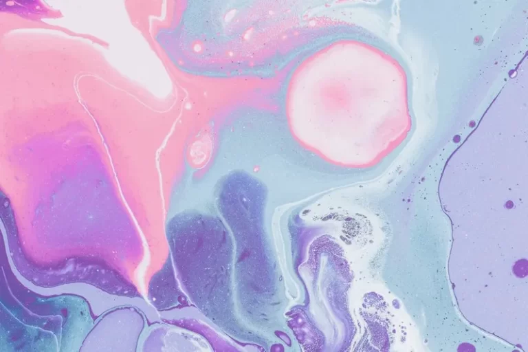 an abstract image of pink and blue swirls in pastel shades