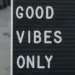 A street sign stating 'good vibes only' - social solidarity