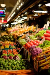 A market with colourful fruit and vegetables - marketisation