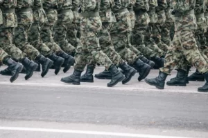 a view of the feet of soldiers on military parade