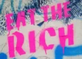 Graffitti which reads 'eat the rich'