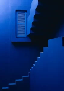 Blue stairs presenting a visual illusion M.C. Escher style - urbanism