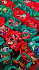 Rows of bags filled with food from a welfare food bank
