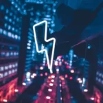 A neon lightning bolt against a blue and purple city backdrop