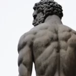 A statie of a muscular oligarch