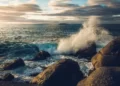 Crashing waves against rocks - power