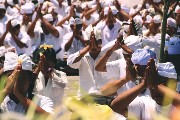 A group of people praying for their religion