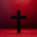 a christian religion cross against a red background