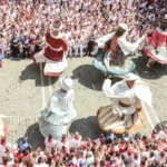 a large festival with dancers