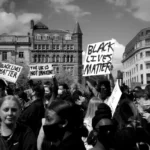 black and white photo of a black lives matter protest - inequality