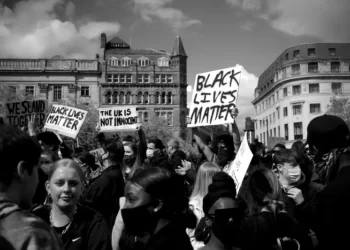 black and white photo of a black lives matter protest - inequality