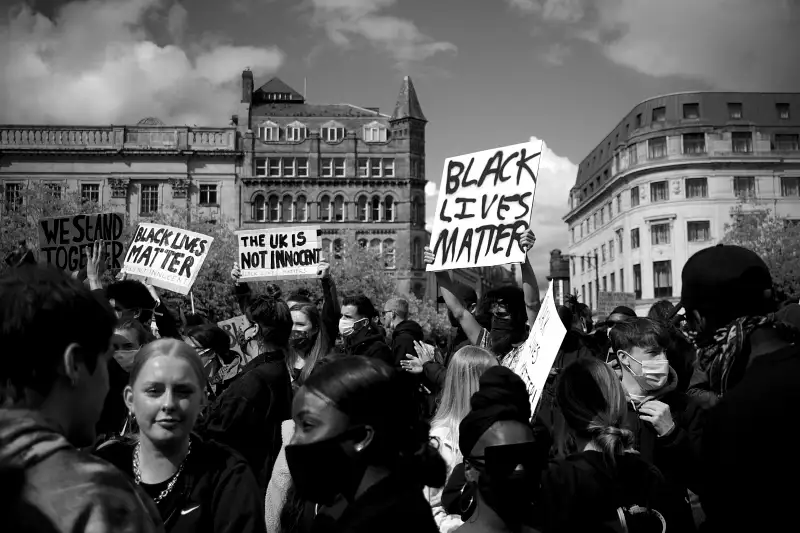 black and white photo of a black lives matter protest - inequality