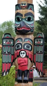 A close up of a totem pole