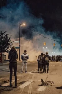 a violent street protest with smoke