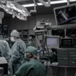 A group of surgeons performing an operation