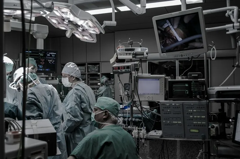 A group of surgeons performing an operation
