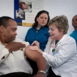 A person receiving an injection