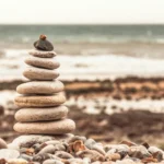 A stack of pebbles on a beach indicating hierarchy