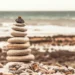 A stack of pebbles on a beach indicating hierarchy