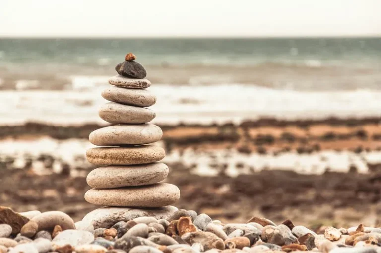 A stack of pebbles on a beach indicating hierarchy