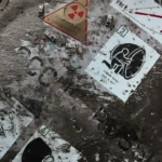 Various worn out labels on concrete