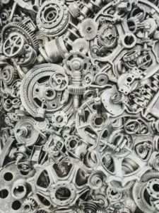 a large collection of mechanical parts in grey