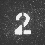 The number two painted on a road