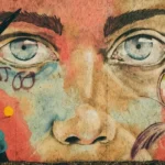 A close up view of a face which forms part of a mural