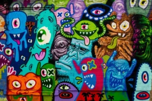 A street art mural of colourful aliens