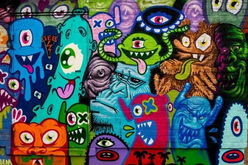 A street art mural of colourful aliens