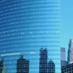 A lifeless corporate building with reflective panels