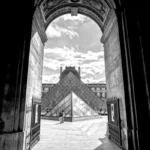 A black and white shot of the louvre in paris where the Da Vainci Code controversy is set