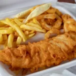 british fish and chips in a tray