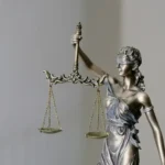 A statue of the scales of justice