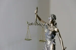 A statue of the scales of justice