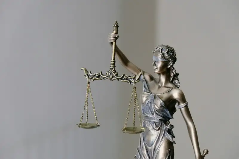 A statue of the scales of justice