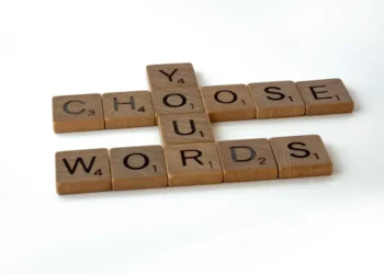 A scrabble crossword with forms the words 'choose your words'