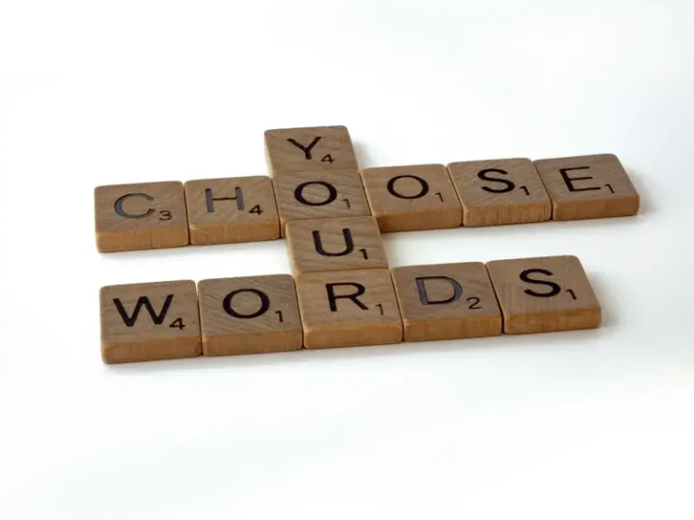 A scrabble crossword with forms the words 'choose your words'