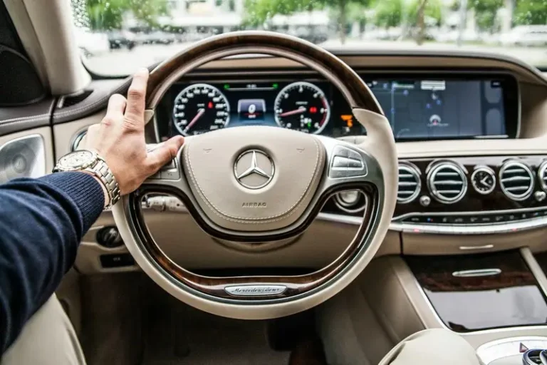A mercedes steering wheel demonstrating conspicuous consumption