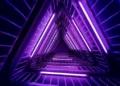 purple flourescent lights arranged in the shape of a triangular tunnel