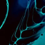 A dark blue and turquoise abstract art piece