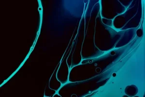 A dark blue and turquoise abstract art piece