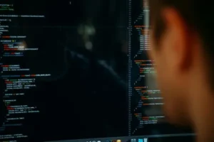 A man looking at sampling code