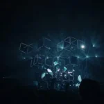A collection of cyber-esque cubes in blue against a black background