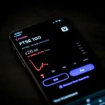 A phone screen displaying economic data