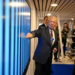 An economic man pointing at things