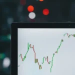 A laptop screen displaying economic data