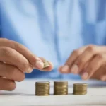 A man counting his coin