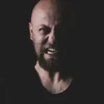 A dark shot of an angry chap