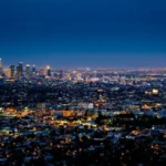 A night view of a city from the sky